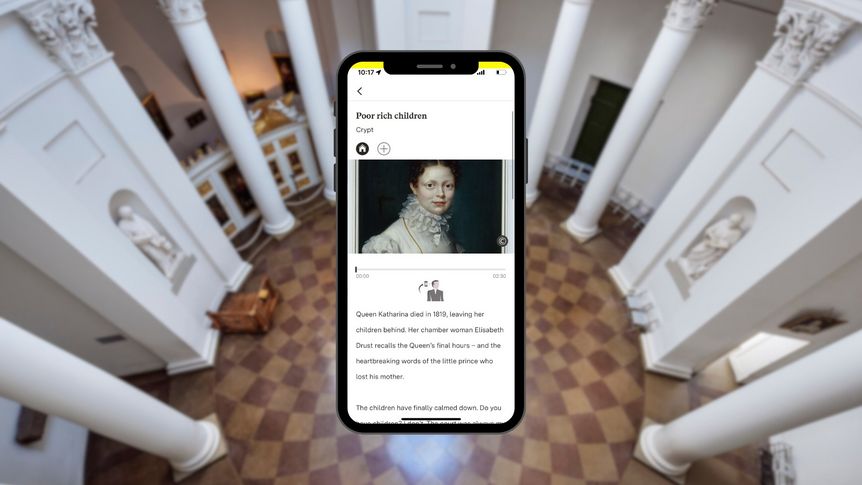 Smartphone with Diversity Tour station in front of an interior view of the Sepulchral Chapel on Württemberg Hill