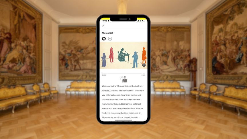 Smartphone with Diversity Tour station in front of the court hall at Mannheim Baroque Palace
